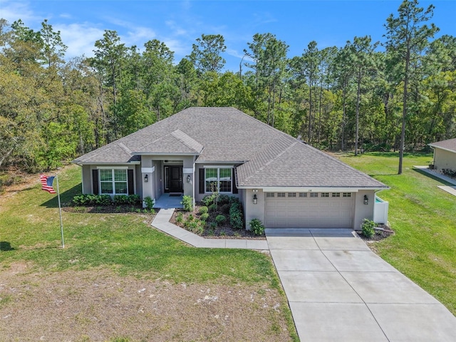 ranch-style home with an attached garage, a front lawn, and stucco siding