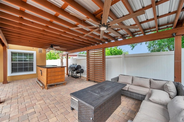 4815 Plantation Dr, Tampa, FL 33615 - view of patio featuring a fenced backyard, ceiling fan, area for grilling, and outdoor lounge area