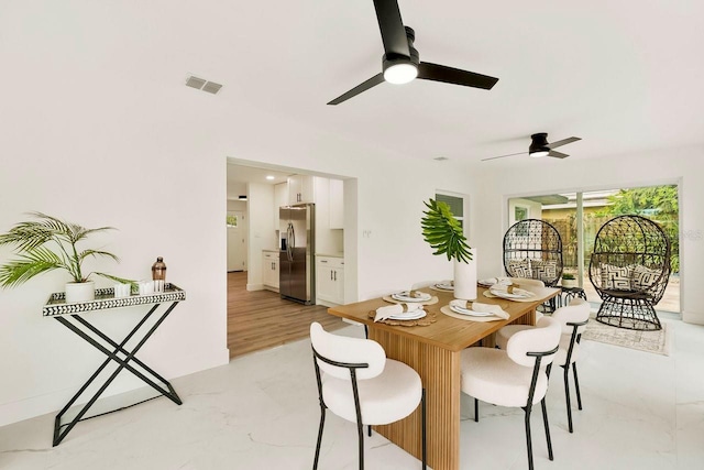 1886 San Mateo Dr, Dunedin, FL 34698 - dining space with visible vents and ceiling fan