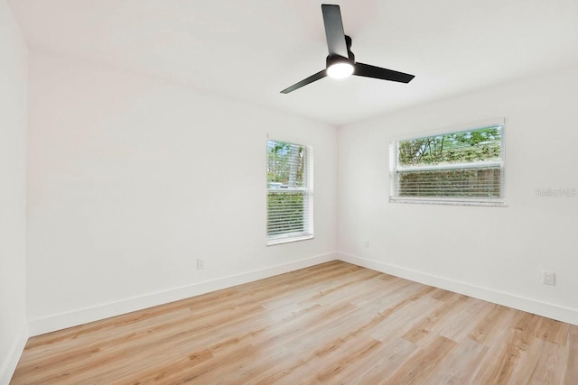 1886 San Mateo Dr, Dunedin, FL 34698 - unfurnished room featuring baseboards, wood finished floors, and ceiling fan
