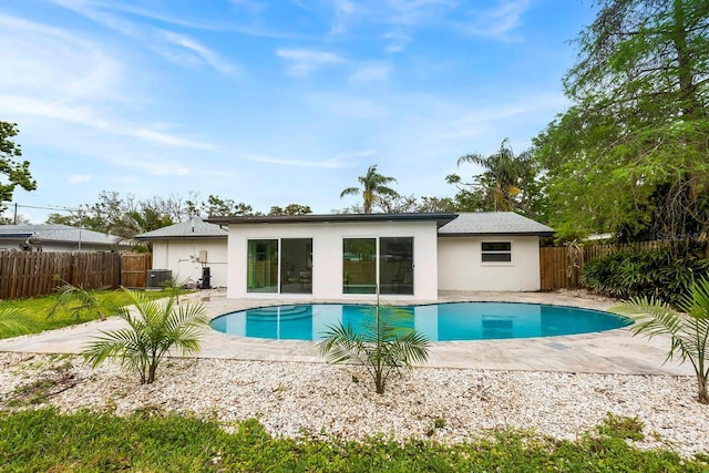1886 San Mateo Dr, Dunedin, FL 34698 - view of pool with a fenced backyard, a fenced in pool, cooling unit, and a patio