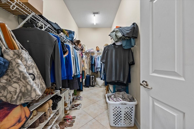 spacious closet featuring tile patterned floors and visible vents