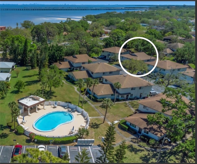 drone / aerial view with a water view