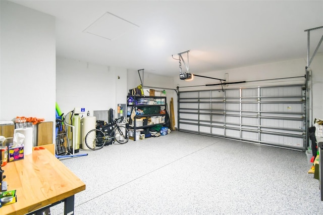 garage featuring a garage door opener