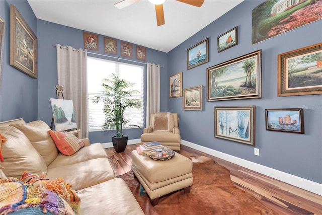 5807 Thoreau Pl, Lithia, FL 33547 - sitting room with a ceiling fan, baseboards, and wood finished floors