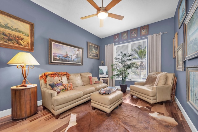 5807 Thoreau Pl, Lithia, FL 33547 - living area with wood finished floors, baseboards, and a ceiling fan