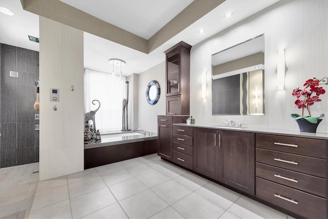 5807 Thoreau Pl, Lithia, FL 33547 - bathroom with a bath, vanity, and tile patterned floors
