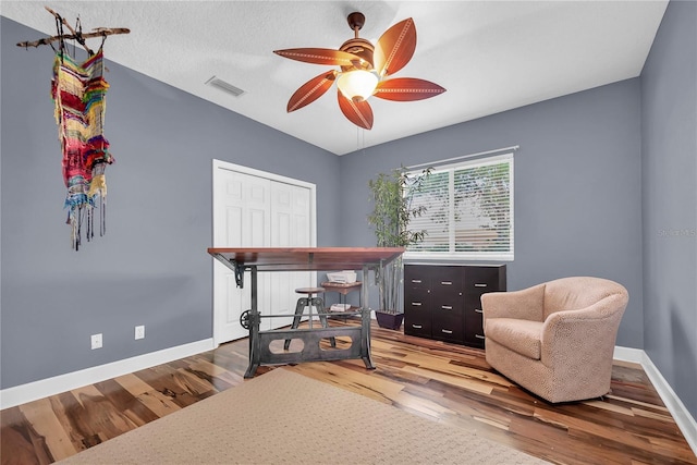 5807 Thoreau Pl, Lithia, FL 33547 - office area featuring wood finished floors, ceiling fan, and baseboards