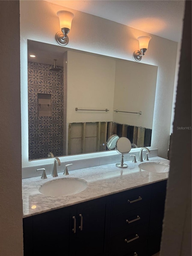 7919 Causeway Blvd S, Saint Petersburg, FL 33707 - full bathroom with double vanity and a textured wall