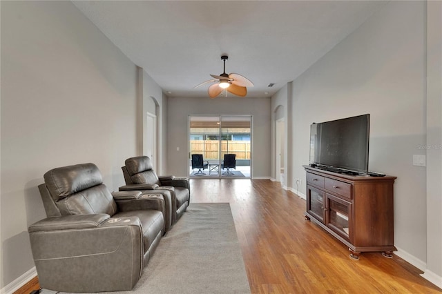 11626 Pure Pebble Dr, Riverview, FL 33569 - living room featuring light wood-type flooring, ceiling fan, and baseboards