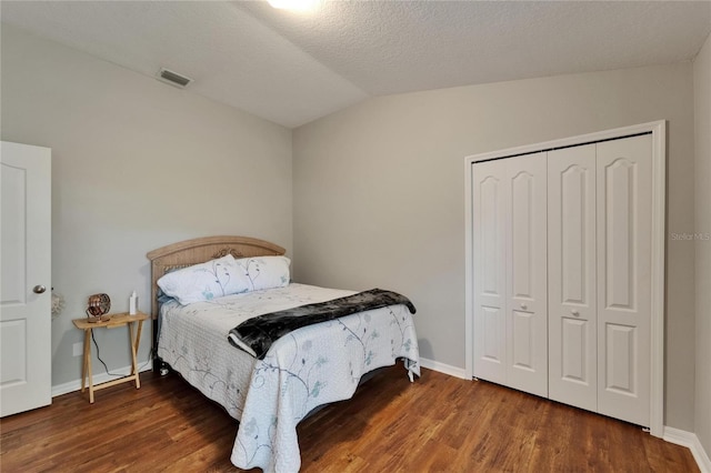 11626 Pure Pebble Dr, Riverview, FL 33569 - bedroom featuring lofted ceiling, baseboards, wood finished floors, and a closet