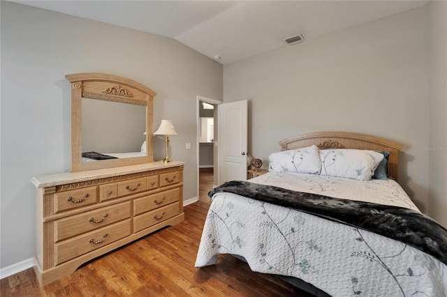 11626 Pure Pebble Dr, Riverview, FL 33569 - bedroom featuring light wood finished floors, lofted ceiling, and baseboards