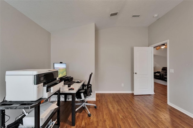 11626 Pure Pebble Dr, Riverview, FL 33569 - home office with vaulted ceiling, wood finished floors, and baseboards
