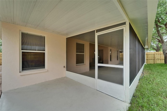 11626 Pure Pebble Dr, Riverview, FL 33569 - view of patio / terrace featuring a sunroom and fence