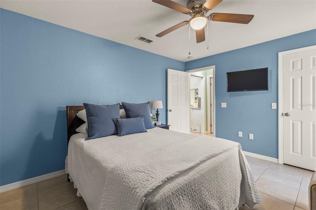 bedroom with baseboards, a ceiling fan, light tile patterned flooring, and visible vents
