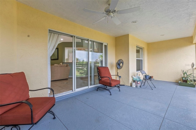 view of patio / terrace featuring a ceiling fan