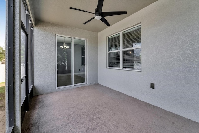 unfurnished sunroom with a notable chandelier