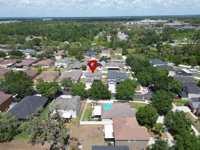birds eye view of property with a residential view
