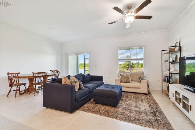 8953 Gallantree Pl, Land O Lakes, FL 34637 - living area with visible vents, ceiling fan, crown molding, and light tile patterned flooring