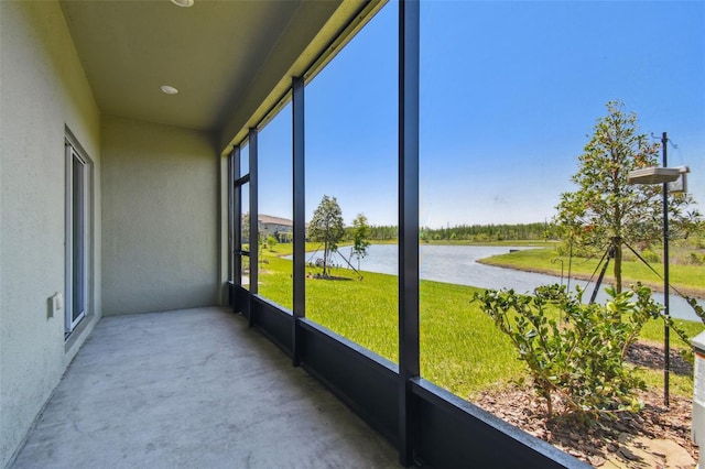 8953 Gallantree Pl, Land O Lakes, FL 34637 - unfurnished sunroom with a water view