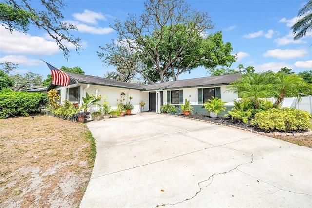 8115 N Ola Ave, Tampa, FL 33604 - view of front of house featuring concrete driveway
