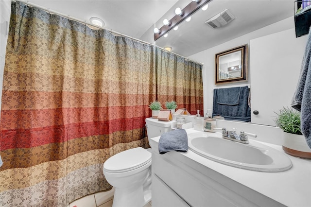 8115 N Ola Ave, Tampa, FL 33604 - bathroom with visible vents, a shower with curtain, toilet, vanity, and tile patterned floors