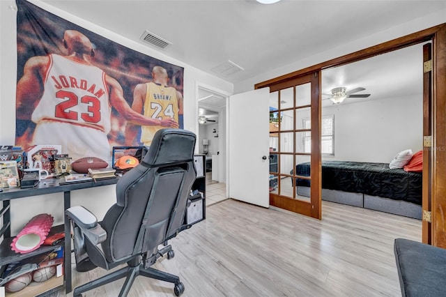 8115 N Ola Ave, Tampa, FL 33604 - office space featuring french doors, visible vents, ceiling fan, and wood finished floors