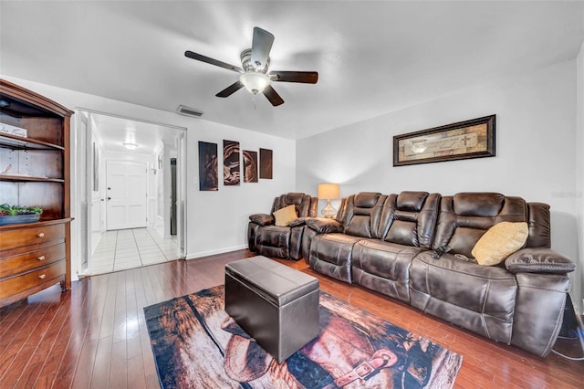 8115 N Ola Ave, Tampa, FL 33604 - living room with visible vents, dark wood-style flooring, baseboards, and ceiling fan