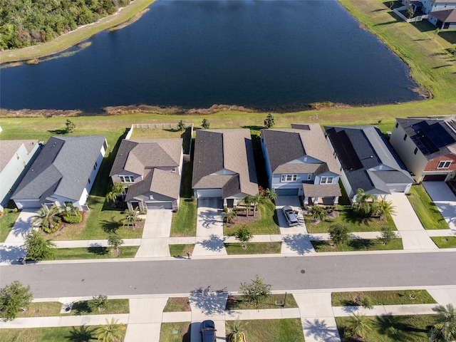 aerial view with a water view and a residential view