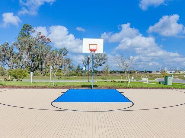 view of sport court with community basketball court
