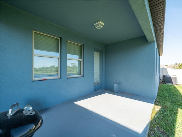 view of patio / terrace with central AC unit
