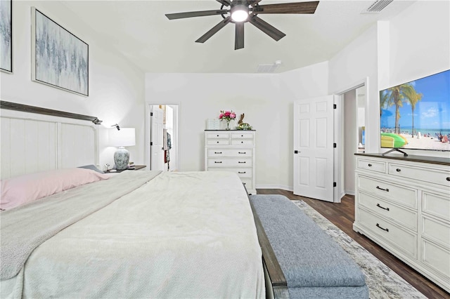 bedroom with dark wood-type flooring, visible vents, and ceiling fan