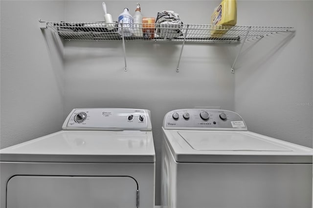 laundry area with washer and dryer and laundry area