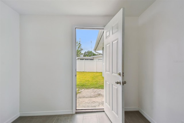 2401 Havana Dr, Clearwater, FL 33764 - entryway featuring tile patterned floors and baseboards
