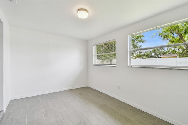 2401 Havana Dr, Clearwater, FL 33764 - unfurnished room with baseboards