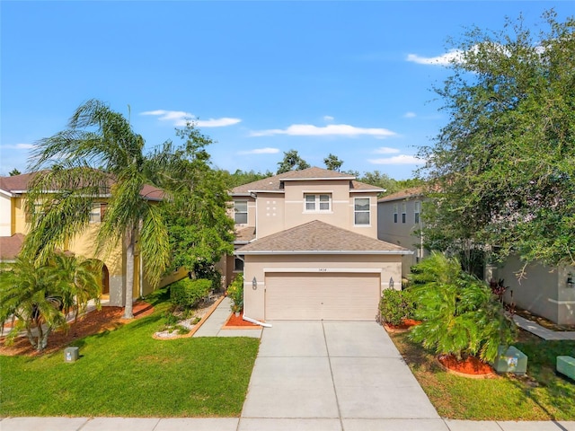 3434 Tarbolton Way, Land O Lakes, FL 34638 - view of front of home featuring a front lawn, concrete driveway, an attached garage, a shingled roof, and stucco siding