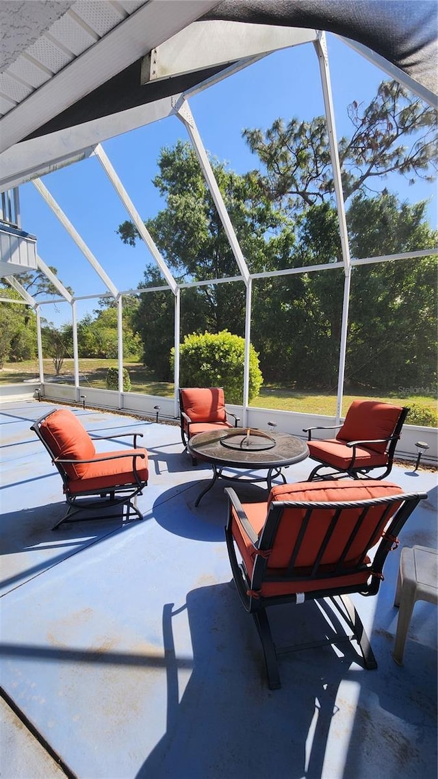 view of patio with a lanai