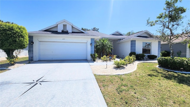 ranch-style home with concrete driveway, a front yard, stucco siding, and an attached garage