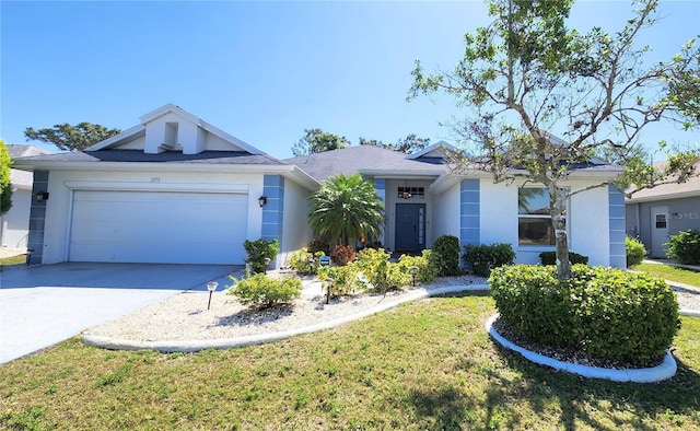 single story home with a garage, driveway, stucco siding, and a front lawn