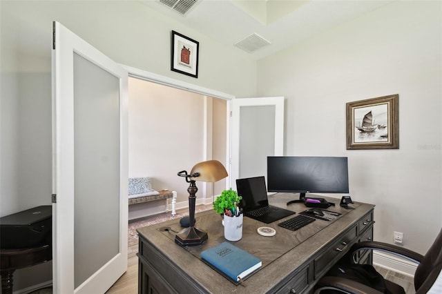 19325 Hawk Valley Dr, Tampa, FL 33647 - office area featuring visible vents, light wood-style flooring, and baseboards