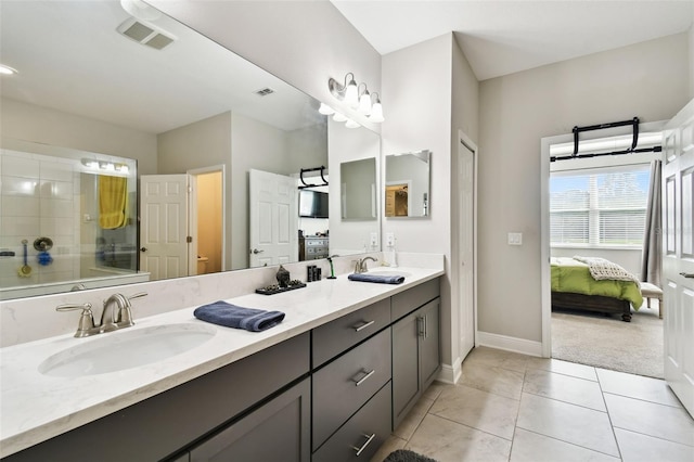 19325 Hawk Valley Dr, Tampa, FL 33647 - full bathroom featuring a sink, visible vents, baseboards, a shower with shower door, and ensuite bath