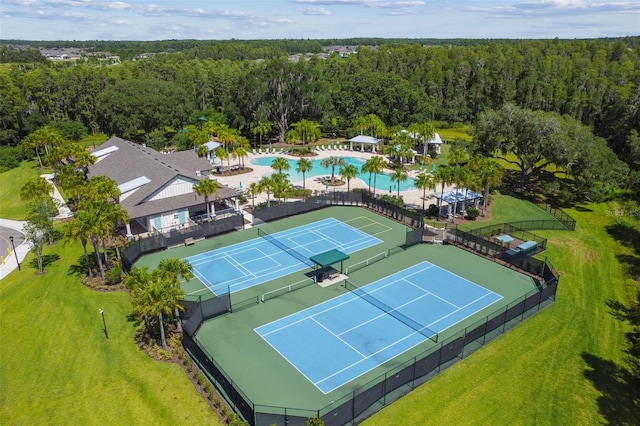 19325 Hawk Valley Dr, Tampa, FL 33647 - birds eye view of property featuring a view of trees