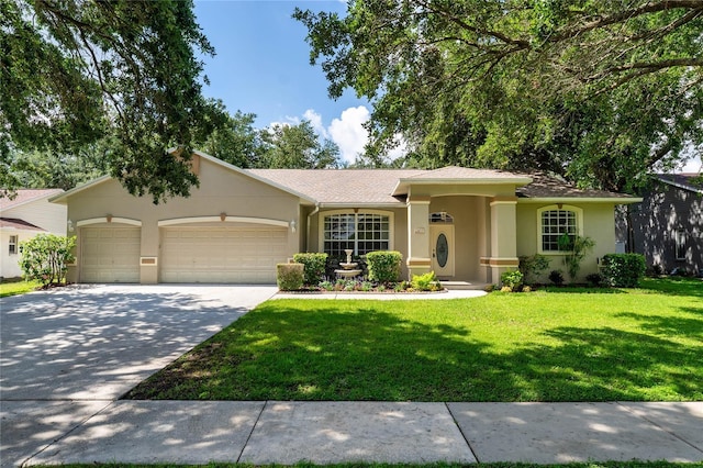2803 Bent Leaf Dr, Valrico, FL 33594 - view of front of house with stucco siding, an attached garage, a front yard, and concrete driveway