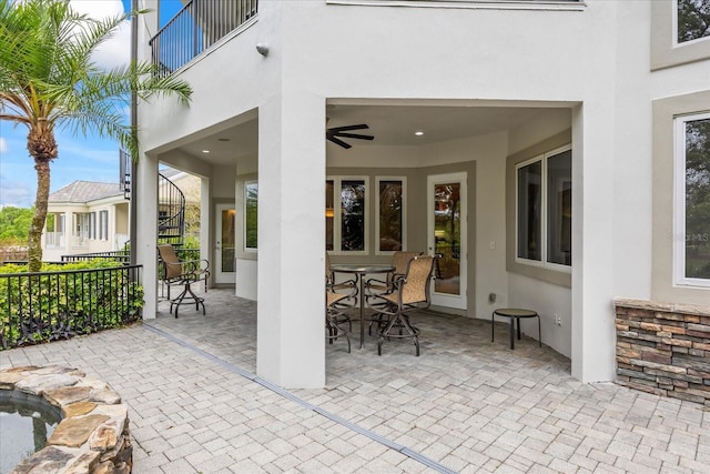 1058 Roundstone Pl, Palm Harbor, FL 34683 - patio / terrace featuring a patio and stairs