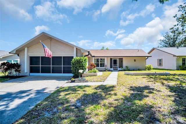 1657 Glengarry Dr, Palm Harbor, FL 34684 - ranch-style home featuring an attached garage, driveway, and a front yard