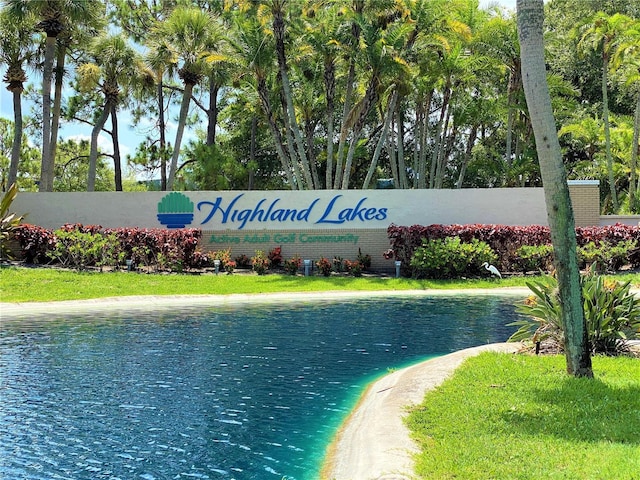 1657 Glengarry Dr, Palm Harbor, FL 34684 - community / neighborhood sign featuring a water view