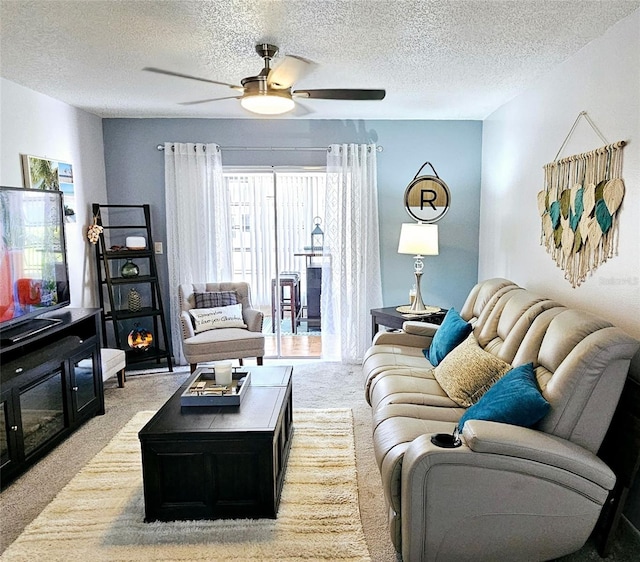 1657 Glengarry Dr, Palm Harbor, FL 34684 - living area featuring light colored carpet, a ceiling fan, and a textured ceiling