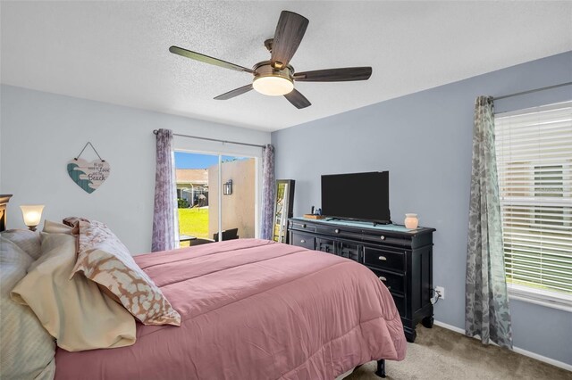 1657 Glengarry Dr, Palm Harbor, FL 34684 - carpeted bedroom with access to outside, baseboards, and ceiling fan