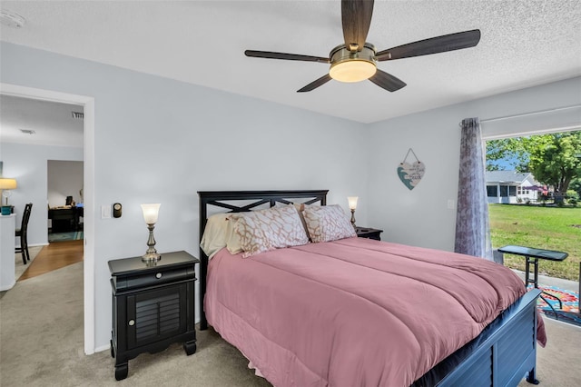 1657 Glengarry Dr, Palm Harbor, FL 34684 - bedroom featuring light colored carpet, a ceiling fan, and access to outside