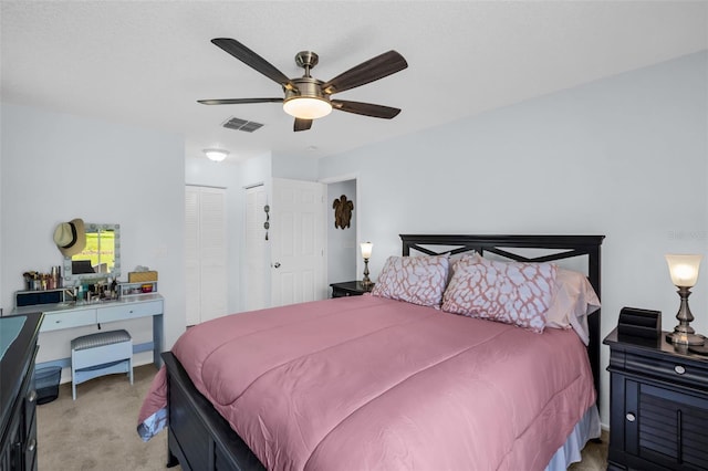 1657 Glengarry Dr, Palm Harbor, FL 34684 - bedroom with visible vents, a ceiling fan, and light colored carpet